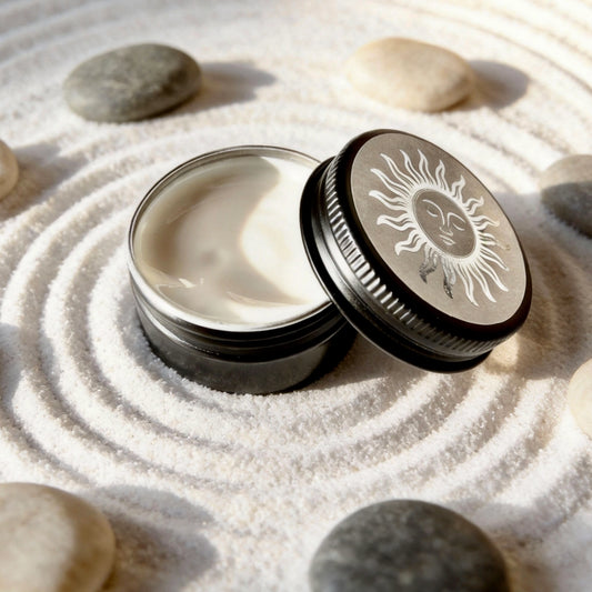 Zen like image of Raayy SPF 50 early bird sample tin (20ml) open with the nourishing formula visible.
